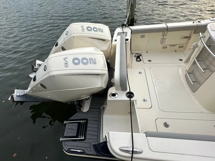  Yacht Photos Pics 2024 Scout 277 LXF boat with dual outboard engines.