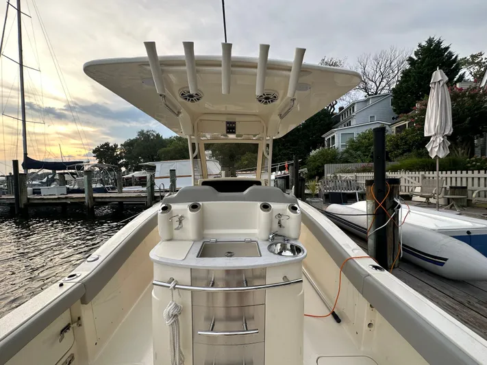  Yacht Photos Pics 2024 Scout 277 LXF boat docked at sunset.