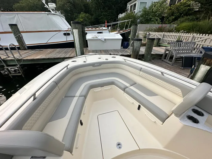  Yacht Photos Pics Interior view of 2024 Scout 277 LXF boat with luxurious seating.