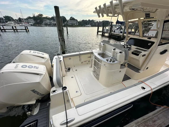  Yacht Photos Pics Scout 277 LXF 2024 boat docked with dual engines.