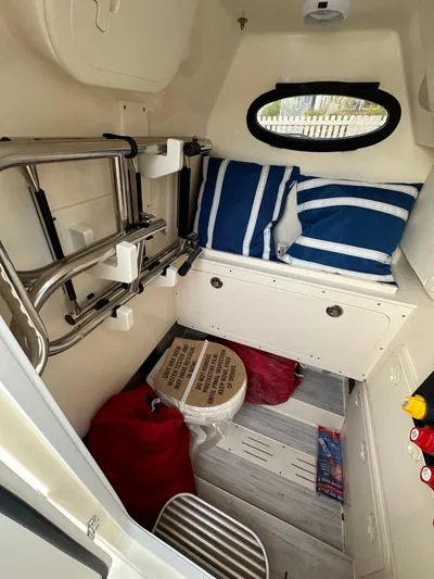  Yacht Photos Pics Interior of 2024 Scout 277 LXF with cushions and storage.