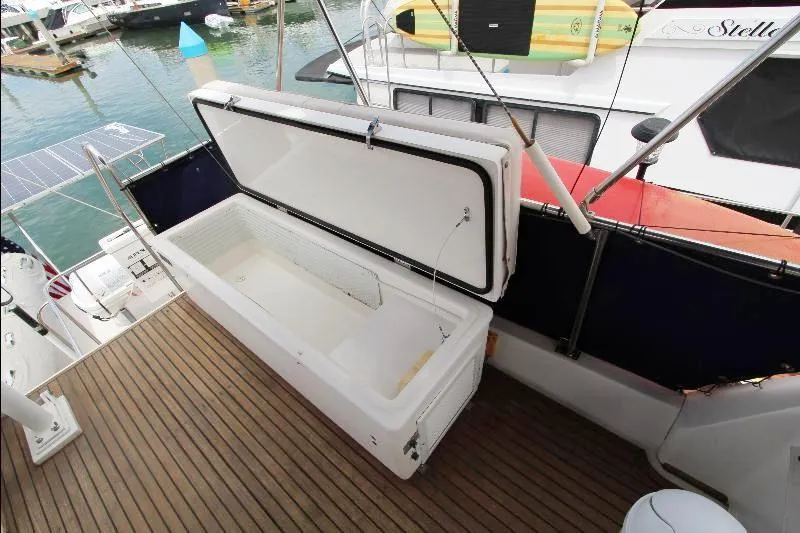  Yacht Photos Pics 1989 Grand Banks Classic yacht with open storage compartment on teak deck.