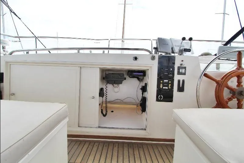  Yacht Photos Pics 1989 Grand Banks Classic yacht helm with wooden wheel and navigation equipment.