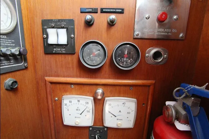  Yacht Photos Pics Control panel of a 1989 Grand Banks Classic boat with gauges and switches.