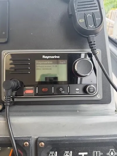 Shelly Anne Yacht Photos Pics Raymarine marine radio system on 2000 Tiara Yachts 5200 Express dashboard.