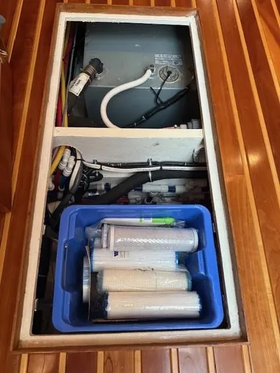 Shelly Anne Yacht Photos Pics Engine compartment of 2000 Tiara Yachts 5200 Express with filters and components.