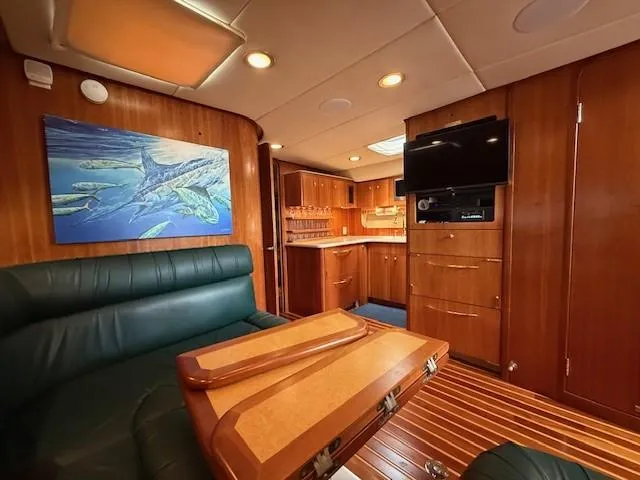 Shelly Anne Yacht Photos Pics Interior of 2000 Tiara Yachts 5200 Express with wood paneling and modern amenities.