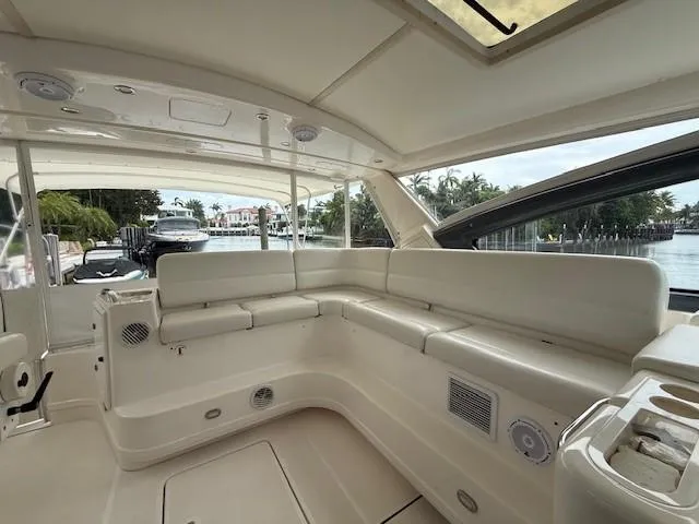 Shelly Anne Yacht Photos Pics Interior view of 2000 Tiara Yachts 5200 Express, featuring spacious seating and elegant design.