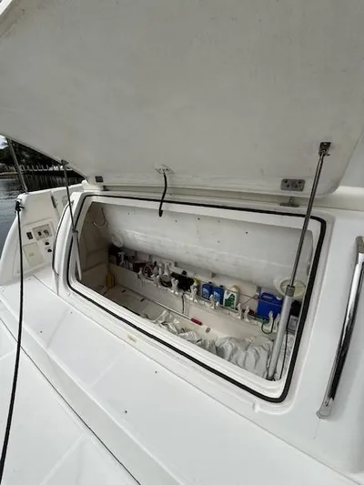 Shelly Anne Yacht Photos Pics Open storage compartment on a 2000 Tiara Yachts 5200 Express boat.