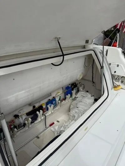 Shelly Anne Yacht Photos Pics Open storage compartment on a 2000 Tiara Yachts 5200 Express boat.