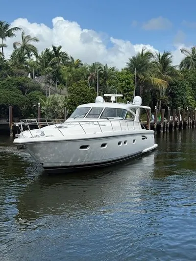 Shelly Anne Yacht Photos Pics 2000 Tiara Yachts 5200 Express cruising on a tropical waterway.