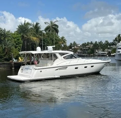 Shelly Anne Yacht Photos Pics 2000 Tiara Yachts 5200 Express cruising on a tropical waterway.
