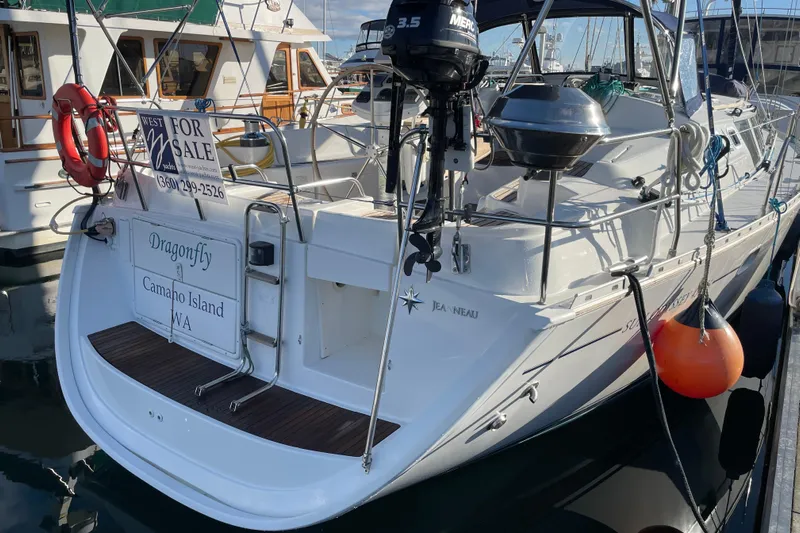 "dragonfly" Yacht Photos Pics 2003 Jeanneau Sun Odyssey 43 DS sailboat for sale, docked at marina.