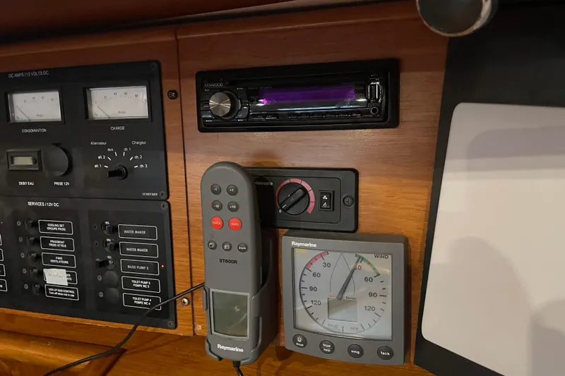 "dragonfly" Yacht Photos Pics Control panel of a 2003 Jeanneau Sun Odyssey 43 DS sailboat with navigation instruments.