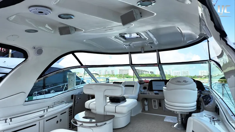  Yacht Photos Pics Interior of 2006 Sea Ray 52 Sundancer yacht with luxurious seating and modern controls.