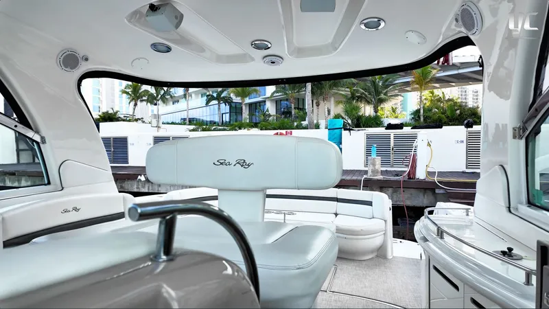  Yacht Photos Pics Interior view of a 2006 Sea Ray 52 Sundancer yacht, featuring luxurious seating and modern design.