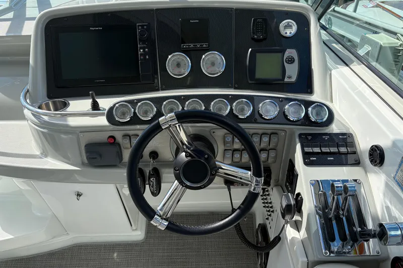  Yacht Photos Pics 2007 Formula 400 Super Sport boat dashboard with steering wheel and navigation controls.