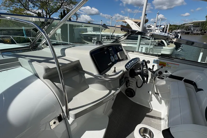  Yacht Photos Pics 2007 Formula 400 Super Sport boat cockpit with steering wheel and control panel.