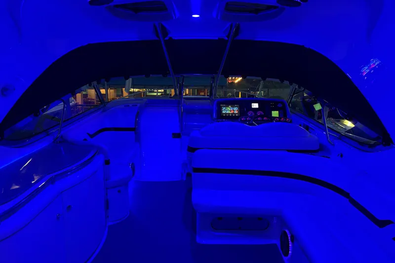  Yacht Photos Pics Interior of a 2007 Formula 400 Super Sport boat with blue ambient lighting.