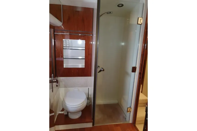 Kamats Yacht Photos Pics Bathroom interior of 2010 Fairline Squadron 55 yacht with shower and toilet.