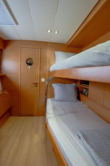  Yacht Photos Pics Lagoon 620 yacht interior with wooden bunk beds, 2014 model.