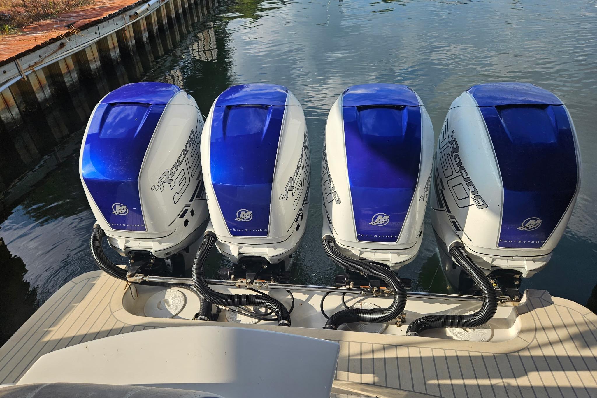 Four powerful outboard engines on a 2019 Concept 44' Cuddy Cabin boat.
