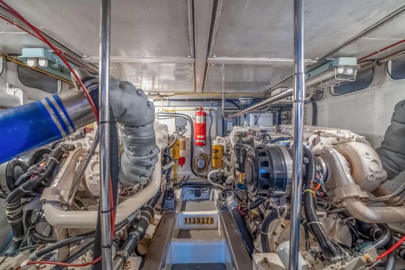 Yachtmaster Yacht Photos Pics Engine room of a 2002 Symbol 58 with complex wiring.