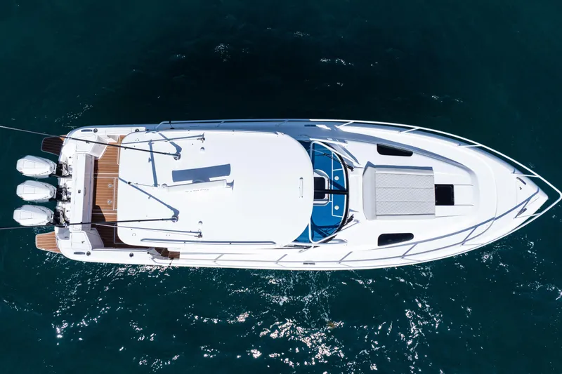  Yacht Photos Pics Overhead view of 2018 Intrepid 438 Evolution yacht on water.