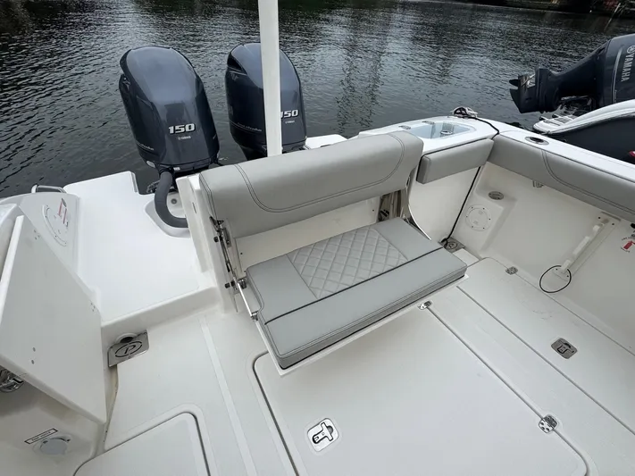  Yacht Photos Pics 2024 Pursuit S 268 boat with dual 150 engines and foldable seating.