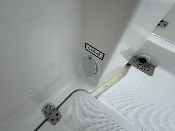  Yacht Photos Pics 2024 Pursuit S 268 boat raw water access point and deck details.