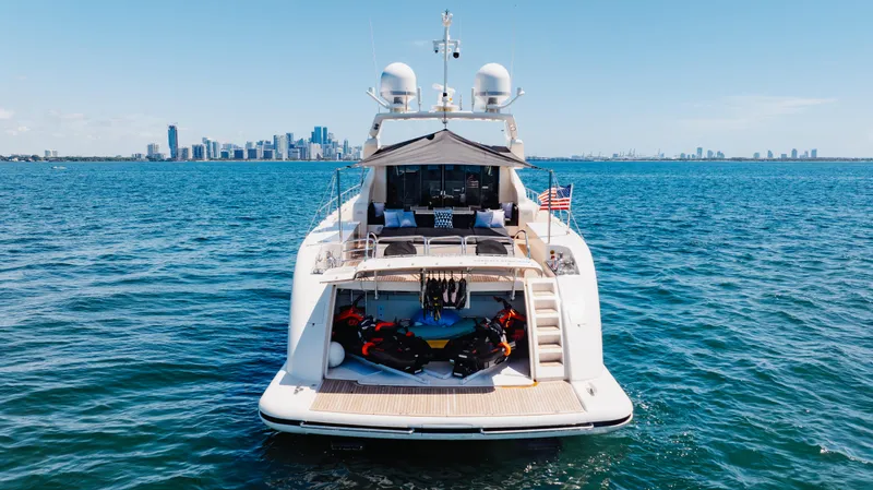 Venture Yacht Photos Pics Luxury Leopard yacht on open water, city skyline in background, 2007 model.