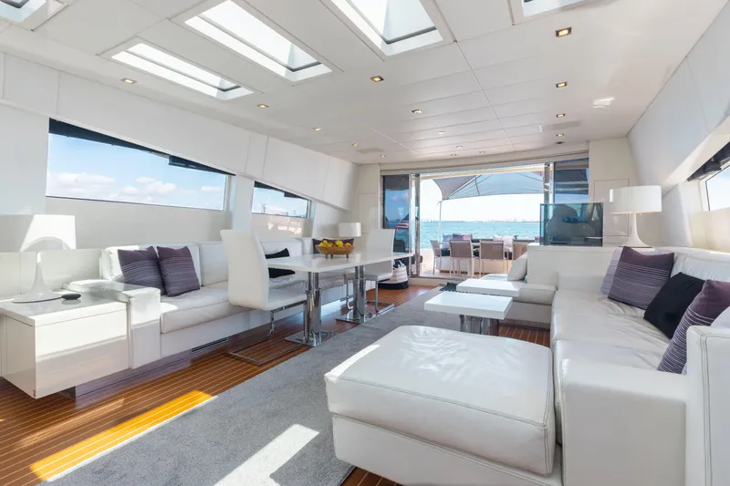 Venture Yacht Photos Pics Luxurious interior of 2007 Leopard Cantiere Navale Arno yacht with modern white furnishings.