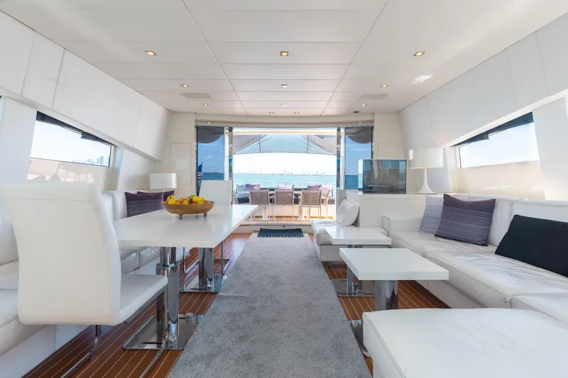 Venture Yacht Photos Pics Luxurious interior of 2007 Leopard Cantiere Navale Arno yacht with modern furnishings and sea view.