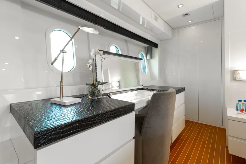 Venture Yacht Photos Pics Luxurious yacht interior with sleek desk, modern lamp, and elegant decor, Leopard Cantiere Navale Arno SpA 2007.