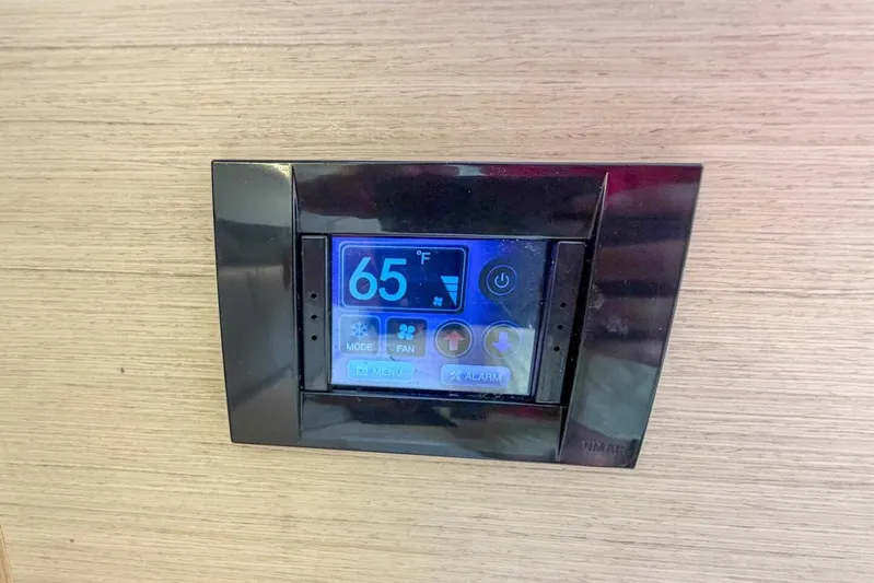 Coastal Distancing Yacht Photos Pics Digital thermostat display on 2021 Beneteau Oceanis 30.1 yacht, showing 65&deg;F.
