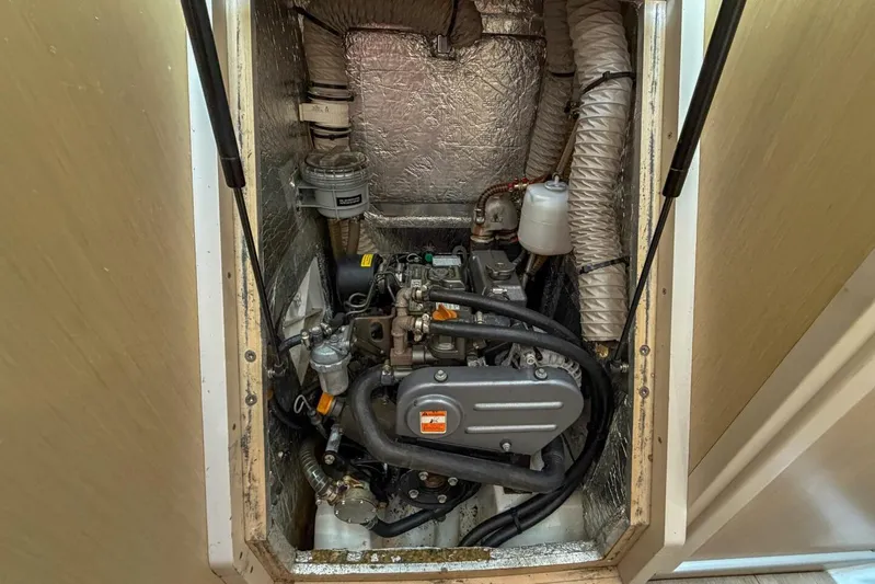 Coastal Distancing Yacht Photos Pics Engine compartment of a 2021 Beneteau Oceanis 30.1 sailboat, showcasing mechanical components.