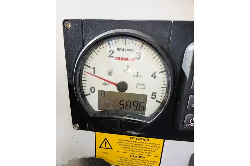 Coastal Distancing Yacht Photos Pics Yanmar RPM gauge on 2022 Beneteau Oceanis 30.1 sailboat dashboard.