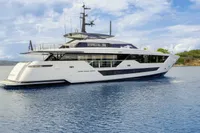 Luxurious 2023 Custom Line CL106 yacht cruising on serene blue waters.