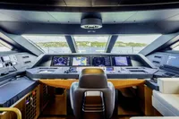 Luxurious yacht cockpit of Custom Line CL106, 2023 model, featuring advanced navigation systems.