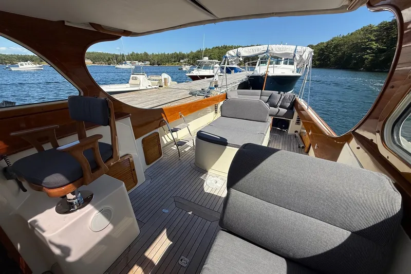 Timothy E Yacht Photos Pics 2001 Hinckley Classic Picnic Boat interior with elegant seating and scenic waterfront view.