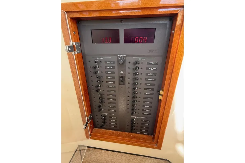 Timothy E Yacht Photos Pics Electrical panel of a 2001 Hinckley Classic Picnic Boat with digital displays and switches.