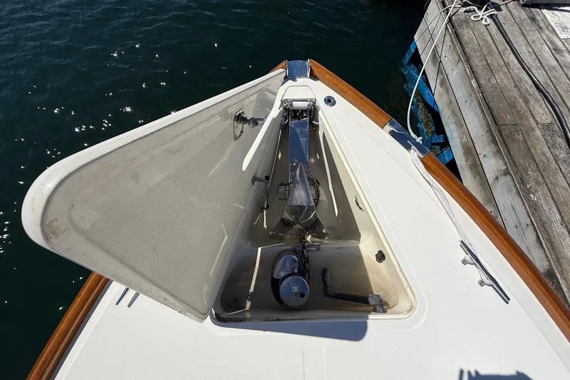 Timothy E Yacht Photos Pics Bow anchor compartment of a 2001 Hinckley Classic Picnic Boat at dock.