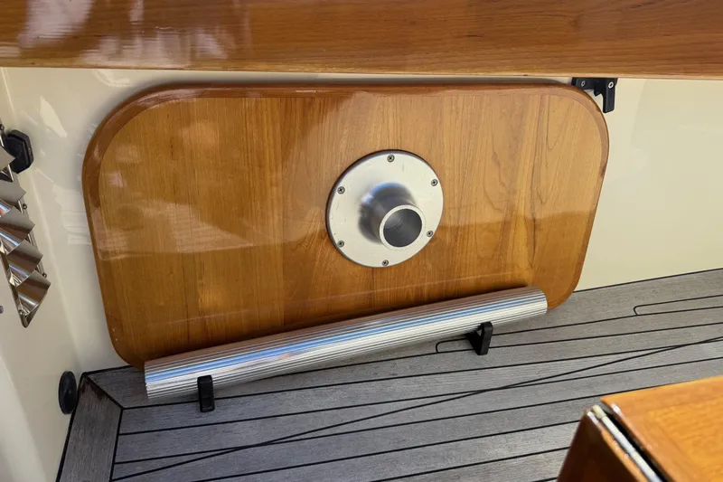 Timothy E Yacht Photos Pics 2001 Hinckley Classic Picnic Boat interior with wooden panel and metal fixture.