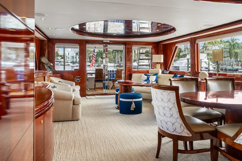 Jusmad Yacht Photos Pics Luxurious interior of 2005 Ocean Alexander 80 yacht with elegant seating and dining area.