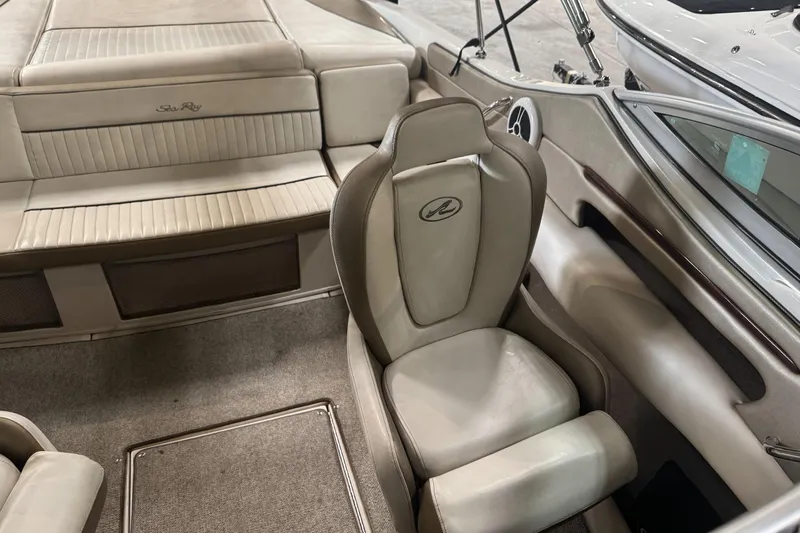  Yacht Photos Pics Interior of 2013 Sea Ray 370 Sundancer with beige seating and carpeted flooring.