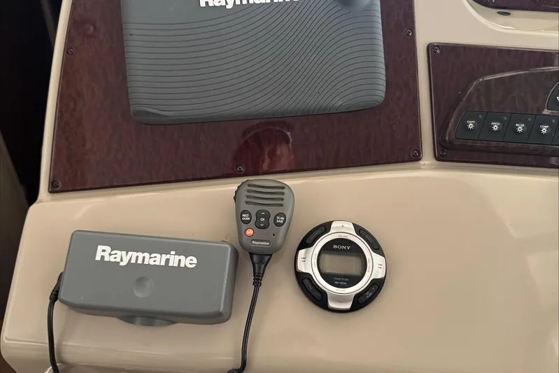  Yacht Photos Pics Control panel of a 2013 Sea Ray 370 Sundancer with Raymarine and Sony equipment.