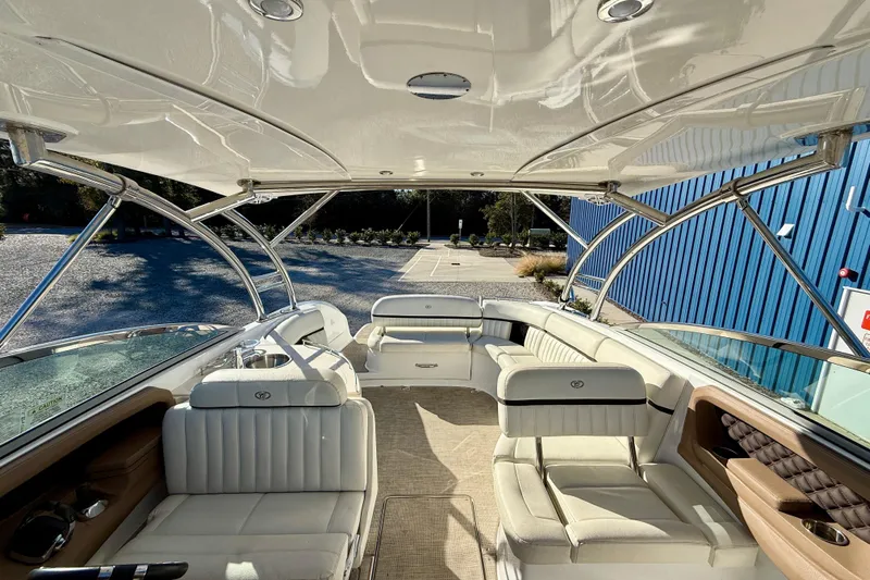  Yacht Photos Pics Luxurious interior of 2018 Cobalt R35 boat with white seating and sleek design.