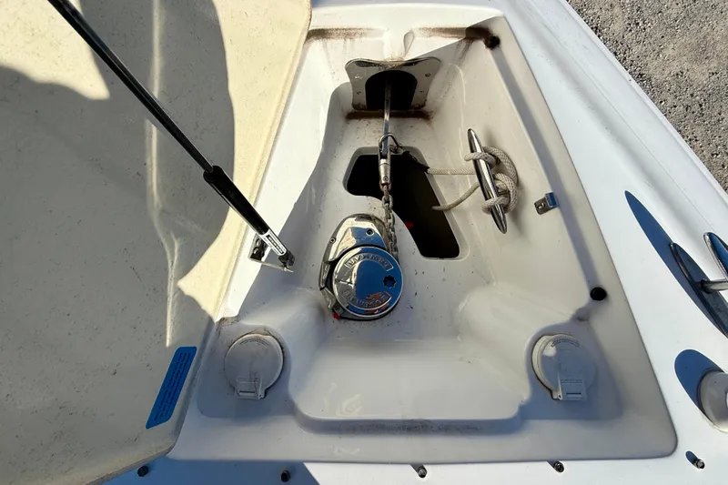  Yacht Photos Pics 2018 Cobalt R35 boat anchor compartment with winch and rope.