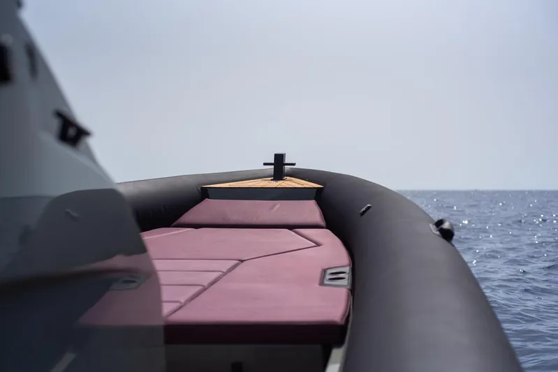  Yacht Photos Pics Luxurious Rock Marine Rock 36 boat deck with maroon seating, 2021 model, on open sea.