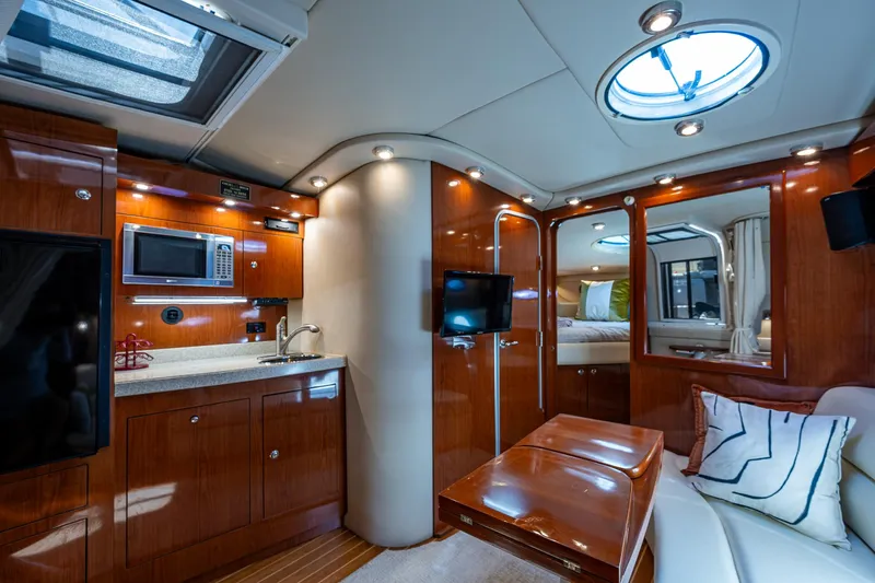  Yacht Photos Pics Luxurious interior of 2006 Regal Commodore 3560 IO yacht with modern amenities.